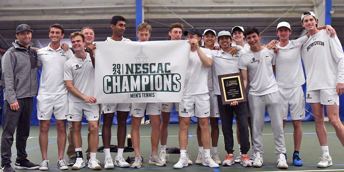 Bowdoin men's tennis holds the NESCAC champs banner and plaque.